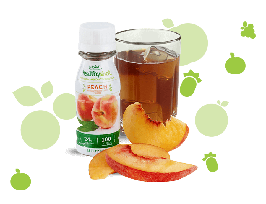 Healthyshot Peach flavored protein supplement beverage served in a glass and flanked by sliced peaches